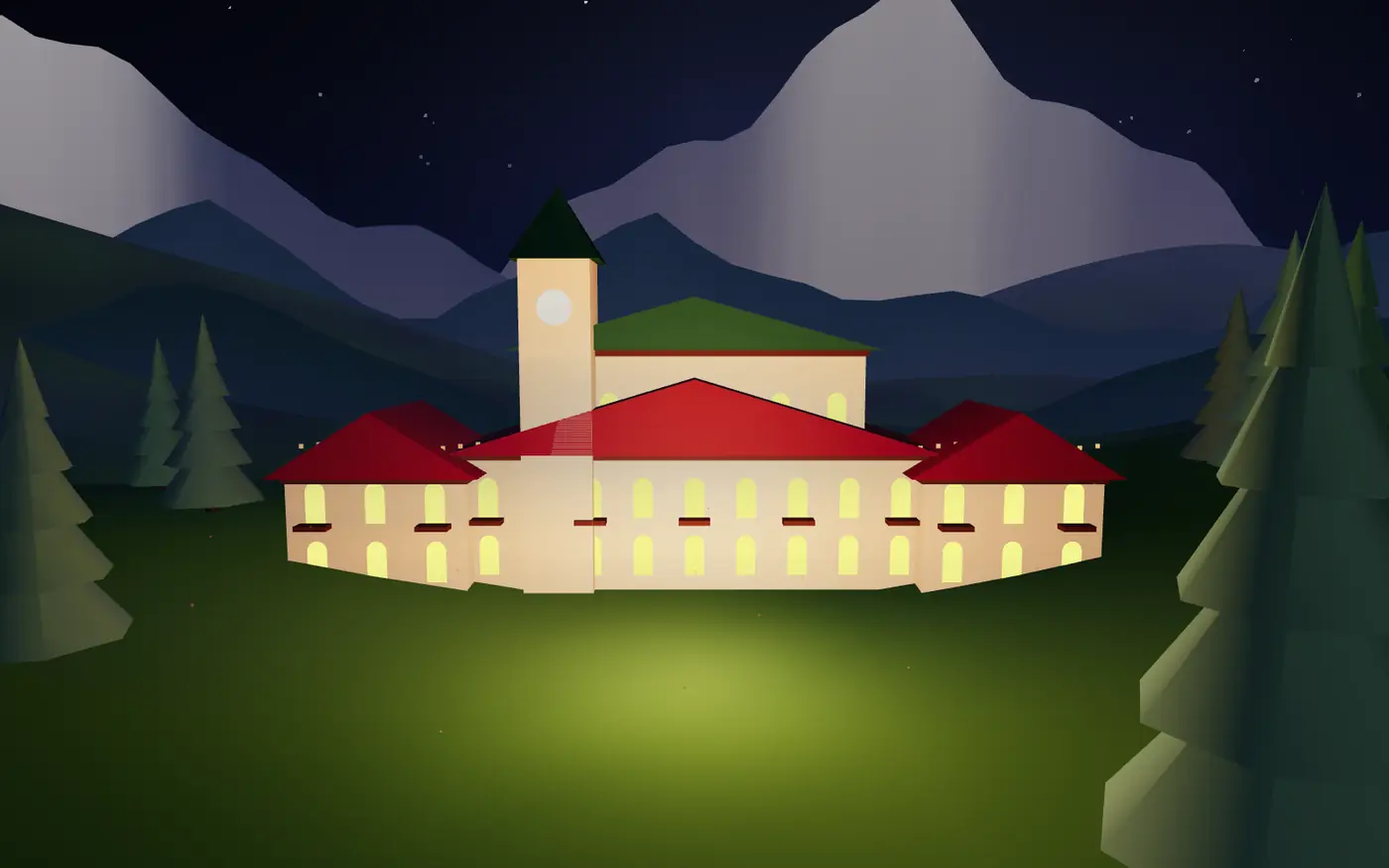 The hotel lit up under a night sky with the range behind